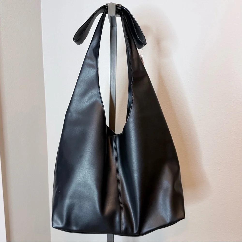 NWT Victoria’s Secret black faux leather hobo bag with bow detail